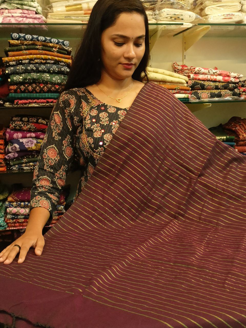 PAVITHRA01 - Pavithra saree wine shade with golden jeri stripes